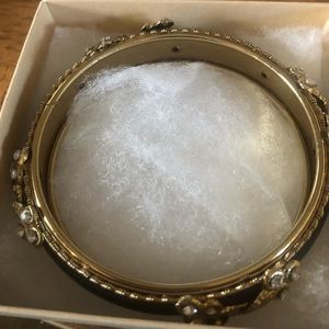 Bangle bracelet. Black and gold. Good condition